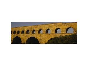 Panoramic Images PPI58742L High section view of an ancient aqueduct Pont Du Gard Nimes Provence France Poster Print by Panoramic Images - 36 x 12 Panoramic Images PPI58742L High section view of an ancient aqueduct Pont Du Gard Nimes Provence France Poster Print by Panoramic Images - 36 x 12