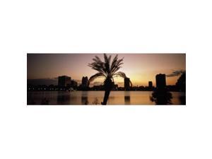 Panoramic Images PPI58577L Silhouette of buildings at the waterfront  Lake Eola  Summerlin Park  Orlando  Orange County  Florida  USA Poster Print by Panoramic Images - 36 x 12