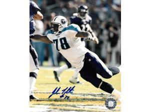 John Thornton signed Tennessee Titans 8x10 Photo #78 (white jersey leap)