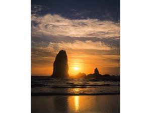 The sun sets along the Oregon coast Cannon Beach Oregon United States of America Poster Print by Robert L Potts  Design Pics (11 x 17)
