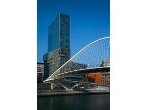 Spain, Bilbao, Zubizuri Bridge over Rio de Bilbao Poster Print by Walter Bibikow (18 x 24) Spain, Bilbao, Zubizuri Bridge over Rio de Bilbao Poster Print by Walter Bibikow (18 x 24)