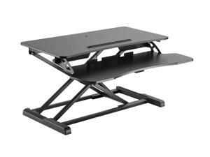 Monoprice Sit-Stand Riser Workstation Desk Converter - Black (31.5 x 15.7in) Table Top for Single Display, Height Adjustable 4.2"-19.7" Max Monoprice Sit-Stand Riser Workstation Desk Converter - Black (31.5 x 15.7in) Table Top for Single Display, Height Adjustable 4.2"-19.7" Max