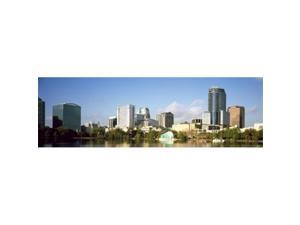 Panoramic Images PPI127702L Buildings at the waterfront  Lake Eola  Orlando  Orange County  Florida  USA 2010 Poster Print by Panoramic Images - 36 x 12