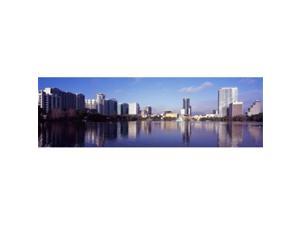 Panoramic Images PPI127704L Buildings at the waterfront  Lake Eola  Orlando  Orange County  Florida  USA 2010 Poster Print by Panoramic Images - 36 x 12