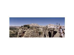 Panoramic Images PPI106309L Tourists standing on a bridge Puente Nuevo Ronda Malaga Province Andalusia Spain Poster Print by Panoramic Images - 36 x 12 Panoramic Images PPI106309L Tourists standing on a bridge Puente Nuevo Ronda Malaga Province Andalusia Spain Poster Print by Panoramic Images - 36 x 12