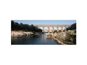 Panoramic Images PPI121701L Aqueduct across a river Pont Du Gard Nimes Gard Languedoc-Rousillon France Poster Print by Panoramic Images - 36 x 12 Panoramic Images PPI121701L Aqueduct across a river Pont Du Gard Nimes Gard Languedoc-Rousillon France Poster Print by Panoramic Images - 36 x 12