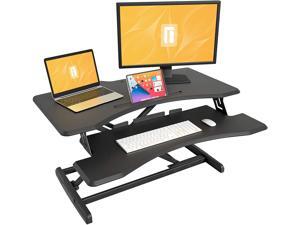 FEZIBO Standing Desk Converter Stand Up Desk Riser, 34 inches Height Adjustable Ergonomic Tabletop Workstation Riser Fits Dual Monitors Black