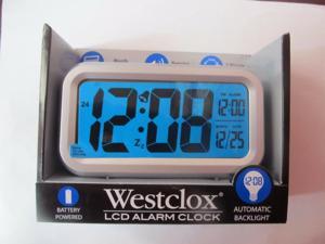 NEW Westclox Blue LCD Alarm Clock 70045A Battery Powered Silver Digital NEW Westclox Blue LCD Alarm Clock 70045A Battery Powered Silver Digital