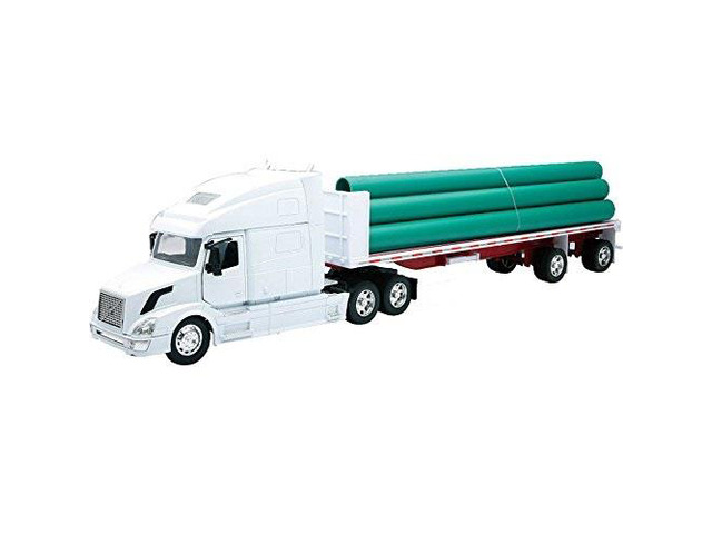 volvo vn780 flatbed w/ long pipe truck new ray
