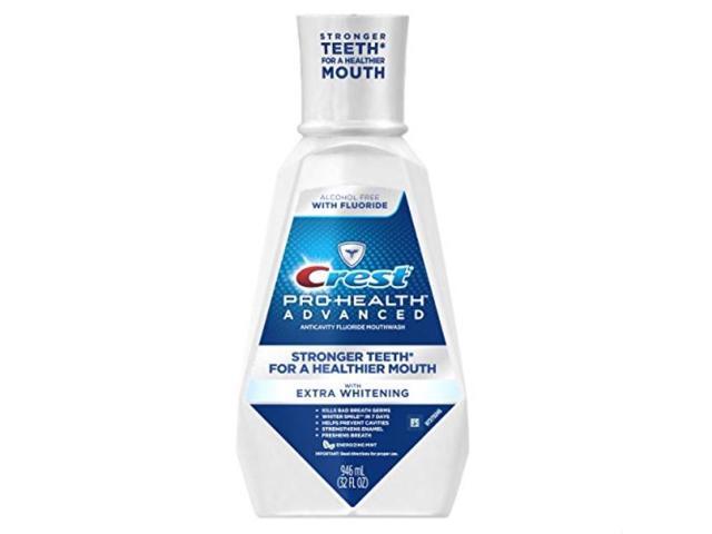 crest prohealth advanced mouthwash with extra whitening, energizing mint, 31.9 fluid ounce