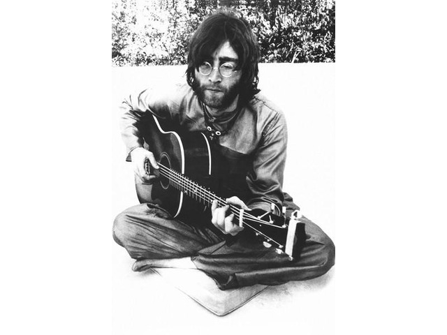 John Lennon Sitting Sitting With Guitar Poster Print (22 x 34)
