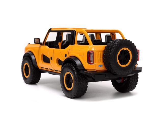 2021 Ford Bronco Orange Metallic with Extra Wheels 'Just Trucks' Series 1/24 Diecast Model Car by Jada