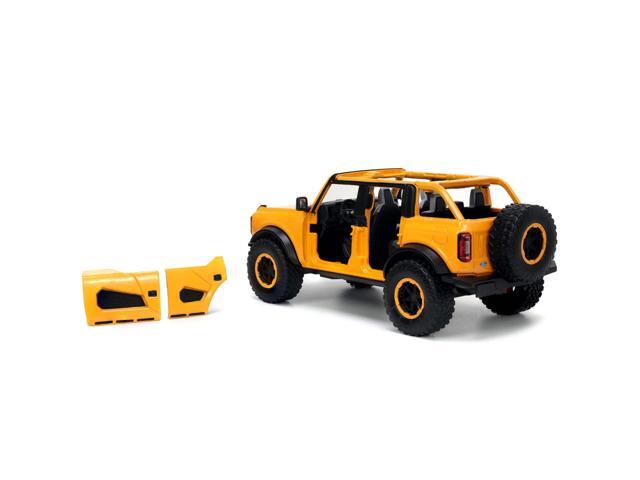 2021 Ford Bronco Orange Metallic with Extra Wheels 'Just Trucks' Series 1/24 Diecast Model Car by Jada