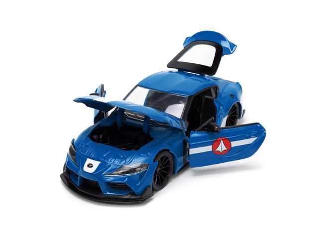 2020 Toyota Supra Blue with Graphics and Max Sterling Diecast Figurine 'Robotech' 'Hollywood Rides' Series 1/24 Diecast Model Car by Jada