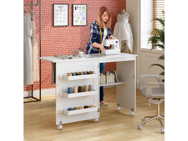 Costway White Folding Sewing Craft Table with Storage Shelves Cabinet Lockable Wheels
