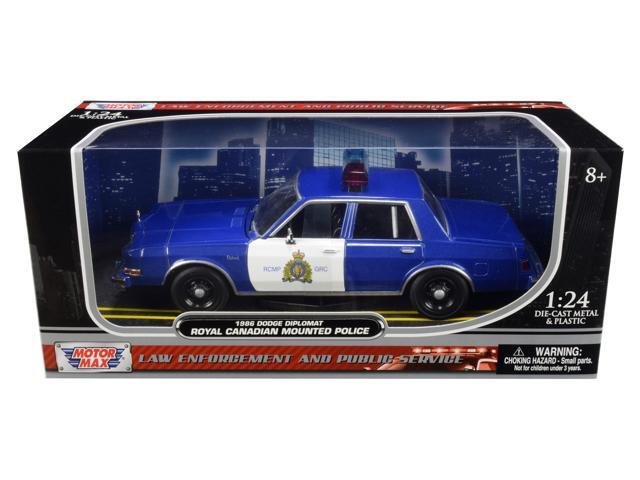 1986 Dodge Diplomat 'Royal Canadian Mounted Police' Metallic Blue and White 1/24 Diecast Model Car by Motormax