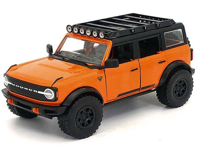 2021 Ford Bronco Orange with Black Stripes and Roof Rack 'Just Trucks' Series 1/24 Diecast Model Car by Jada