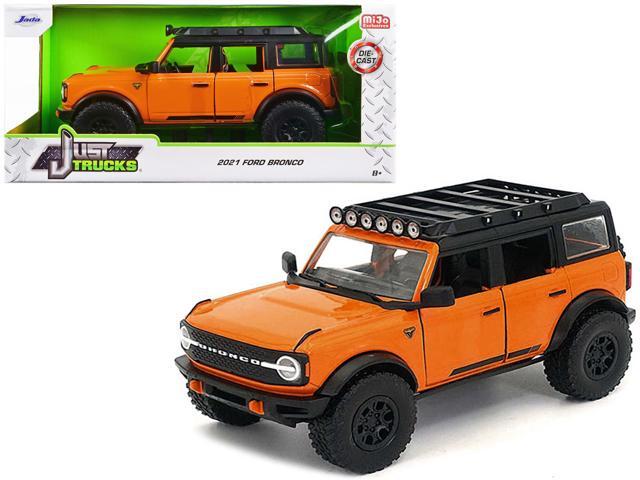 2021 Ford Bronco Orange with Black Stripes and Roof Rack 'Just Trucks' Series 1/24 Diecast Model Car by Jada