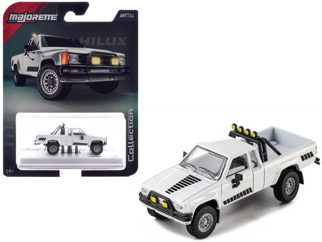 1985 Toyota Hilux SR5 Pickup Truck White with Black Graphics 'Collection' Series 1/64 Diecast Model Car by Majorette