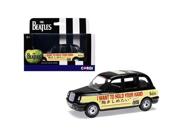 The Beatles London Taxi RHD (Right Hand Drive) 'I Want To Hold Your Hand' Black and Cream with Graphics Diecast Model by Corgi