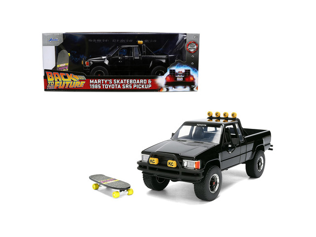 1985 Toyota SR5 Pickup Truck Black with Marty's Skateboard 'Back to the Future' (1985) Movie 1/24 Diecast Model Car by Jada