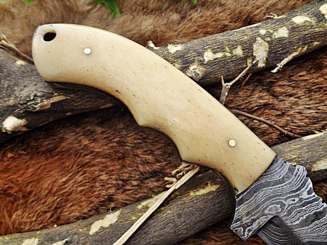 10' Long hand forged twist pattern full tang hand forged Damascus steel tracker knife, Natural Camel bone scale with inserting holes, Cow hide...