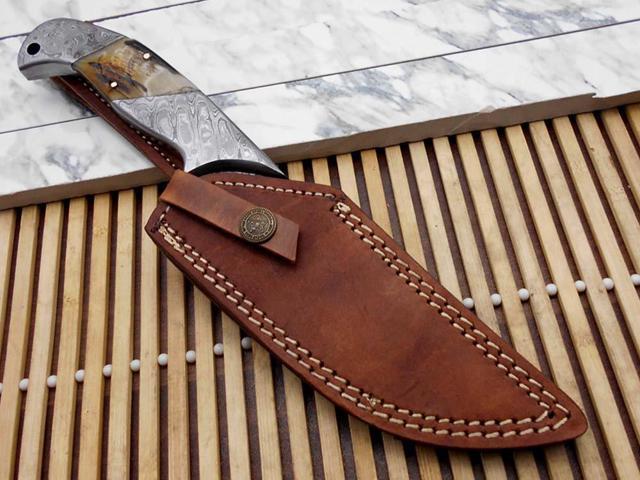 10.5 Long hand forged Damascus steel skinning Knife,5.5' full tang blade, Natural Ram horn scale with Damascus bolster & Pommel, Cow hide Leather...