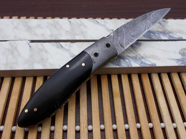 Damascus steel 7.8' long Folding Knife Bull horn with Damascus bolster scale, custom made 3.2' Hand Forged blade cow hide leather sheath