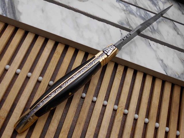 Laguiole Folding Damascus steel knife. hand forged custom twist pattern 4' Blade. Available in various scales with brass bolster. Cow hide leather...
