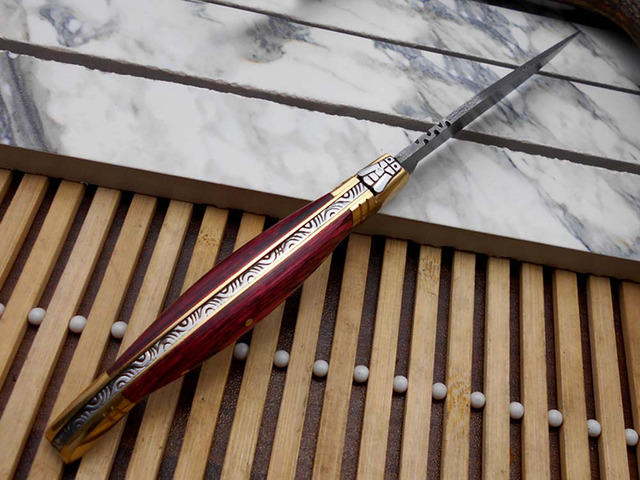 Laguiole Folding Damascus steel knife. hand forged custom twist pattern 4' Blade. Available in various scales with brass bolster. Cow hide leather...