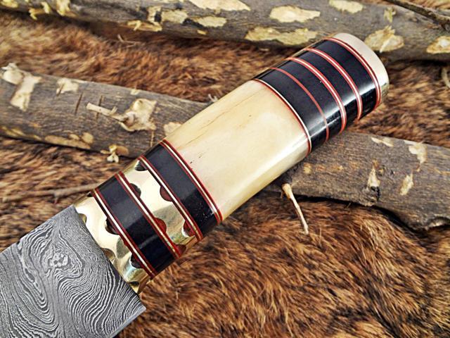 9.5' Long Damascus steel Skinning Knife hand forged Twist pattern Damascus steel, Bull horn round scale crafted with engraved brass spacer & cap,...