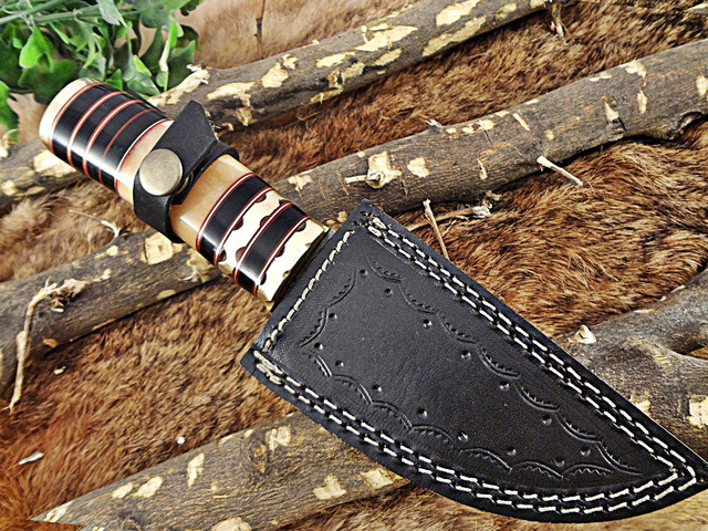 9.5' Long Damascus steel Skinning Knife hand forged Twist pattern Damascus steel, Bull horn round scale crafted with engraved brass spacer & cap,...