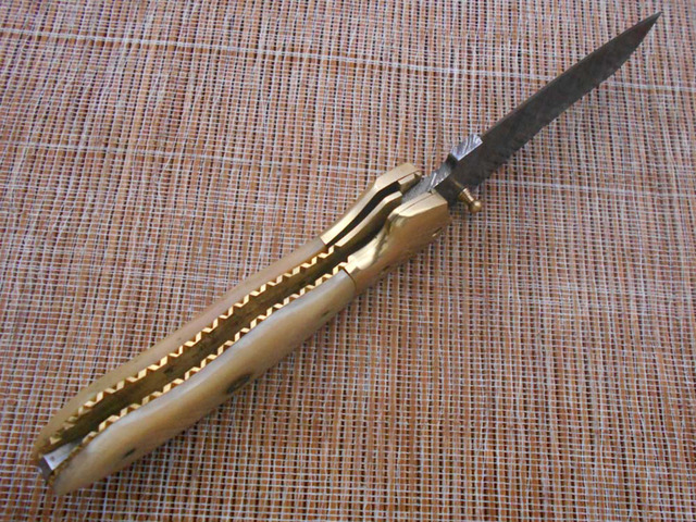8' Tanto blade folding knife, Natural Ram horn scale, Hand forged Twist Pattern Damascus steel, Equipped with Thumb pin & liner lock, Cow hide...