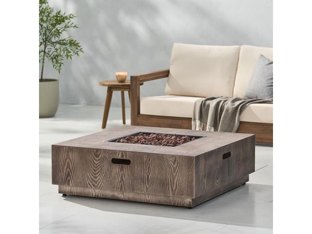 WELLINGTON SQUARE IRON WOOD PATTERN FIRE PIT -50,000 BTU Tank outside