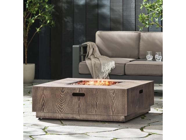 WELLINGTON SQUARE IRON WOOD PATTERN FIRE PIT -50,000 BTU Tank outside
