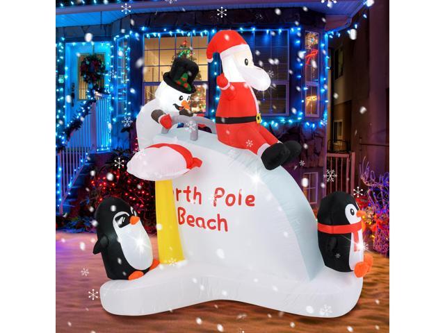 SlickBlue 6 Feet Christmas Inflatable with Blow up Penguins and Santa Decoration