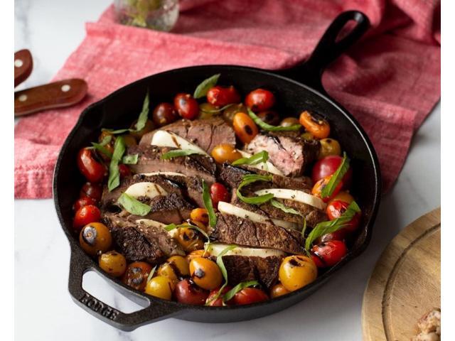 Lodge 10.25 Inch Cast Iron Pre-Seasoned Skillet Signature Teardrop Handle - Use in the Oven, on the Stove, on the Grill, or Over a Campfire, Black
