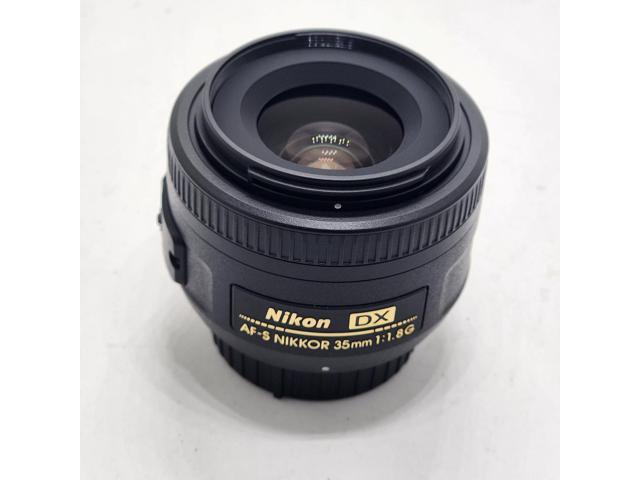 Nikon AF-S DX NIKKOR 35mm f/1.8G Lens (Black) + Lens Pouch + Filter Kit Bundle