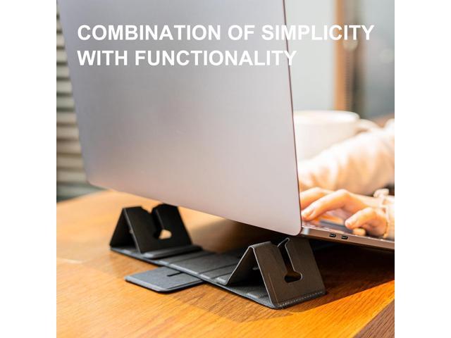 Magnetic Adjustable Travel Laptop Stand for Digital Nomads and Business Travelers. Compact, Foldable, and Ideal for Desk Use. Elevate Your Work...