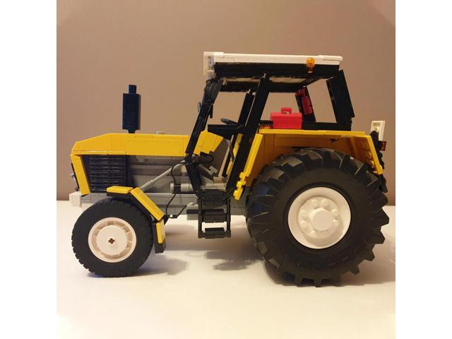 ZITIANYOUBUILD C3974 Yellow Tractor Farm Machine with Spinning Wheels 1089 Parts Gift