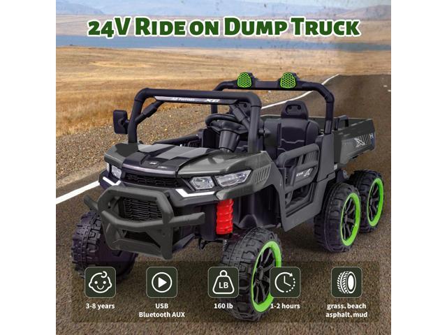 TCARAIWEN Kids 2 Seater Ride on Car 24V Electric Dump Truck 4WD Off-road UTV with Low & High Speeds Remote Control Bluetooth Music LED Lights