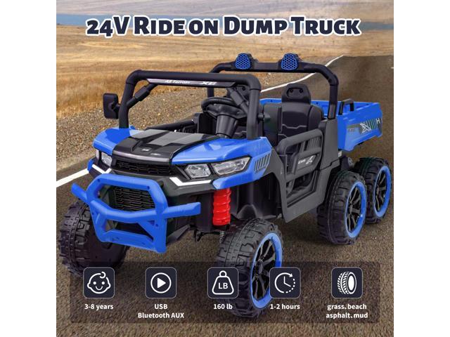 TCARAIWEN Kids 2 Seater Ride on Car 24V Electric Dump Truck 4WD Off-road UTV with Low & High Speeds Remote Control Bluetooth Music LED Lights