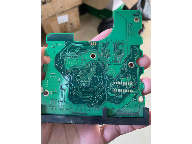 Circuit board hard disk board number 100306336 REV A white el 10027634