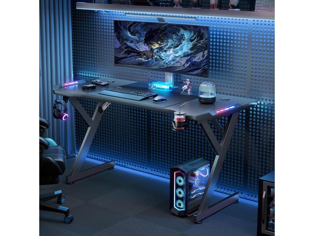 HLDIRECT 55 Inch Gaming Desk with LED Lights, Ergonomic Computer Gaming Table with Carbon Fibre Surface, Sturdy PC Workstation Desk for Gaming and...