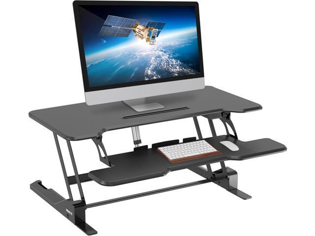 Mount-It! Electric Standing Desk Converter with 38' Tabletop, Height Adjustable Sit Stand Desk Riser, Motorized Desk Riser with Keyboard Tray and.