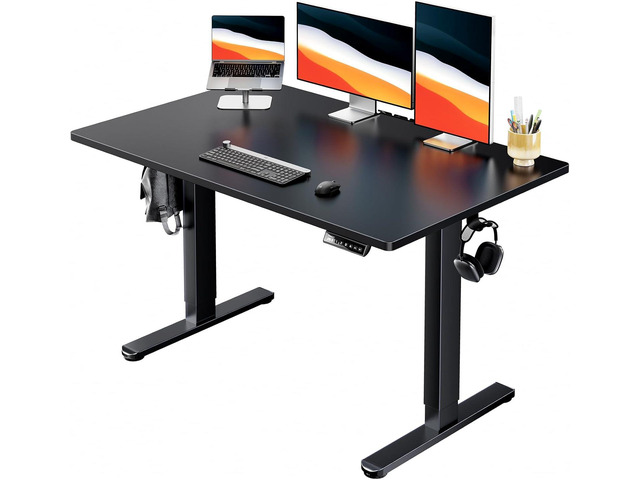 HUANUO Electric Standing Desk, 48' x 30' Whole Piece Desktop, Adjustable Height Computer Desk, 4 Height Memory Settings, Sit Stand Up Desk for Home...