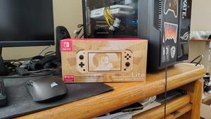 Nintendo Switch™ Lite: Hyrule Edition with Bonus Nintendo Switch
