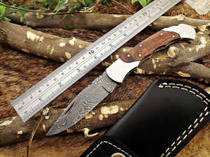 Damascus steel 7.5" long Folding Knife, Walnut wood with Steel bolster scale, custom made 3.5" Hand Forged blade cow hide leather sheath