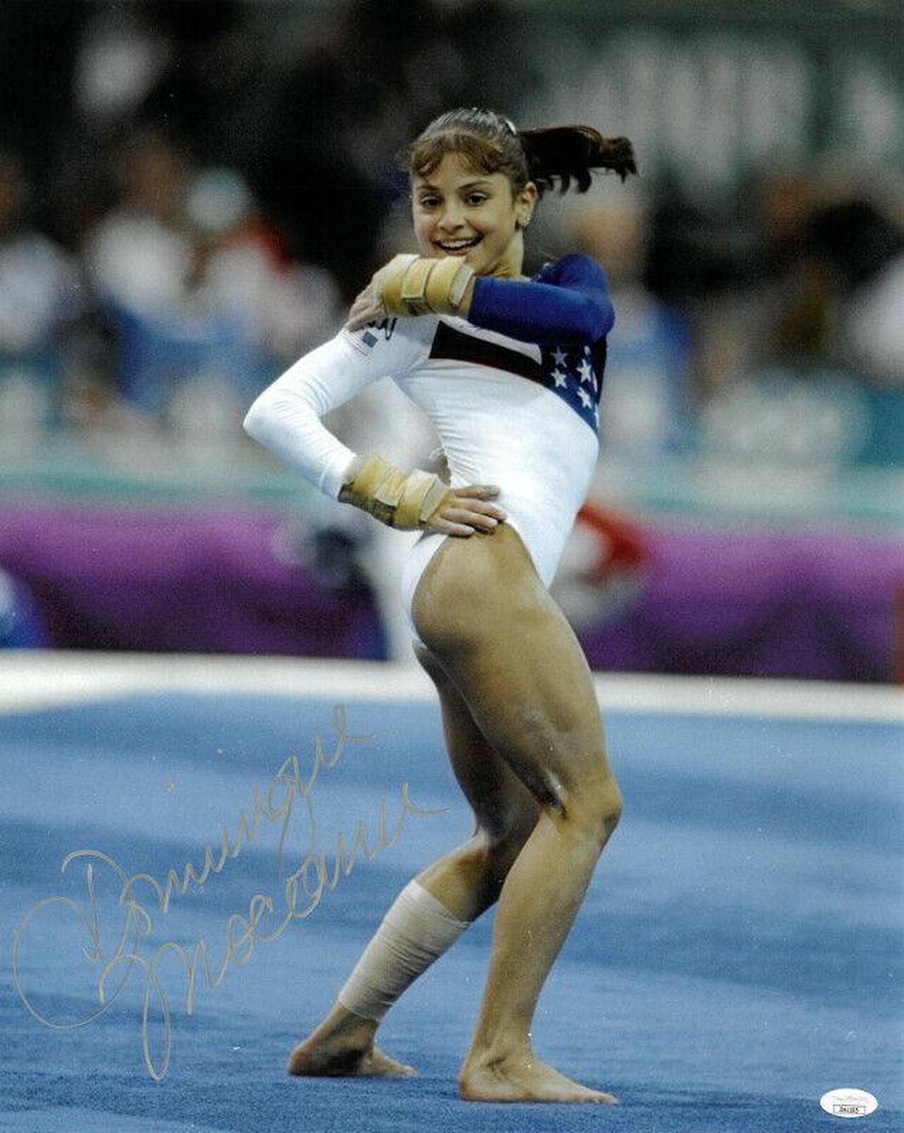 Main image of Dominique Moceanu signed 1996 Team USA Atlanta Olympics Gymnastic 16x20 Photo- JSA (Gold Medal/Magnificent Seven)