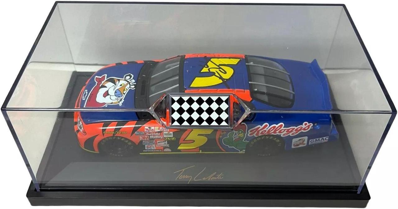 Main image of Terry Labonte signed 2002 Team Caliber #5 Kellogg's Monte Carlo 1:24 Diecast Car w/ Custom Case- COA